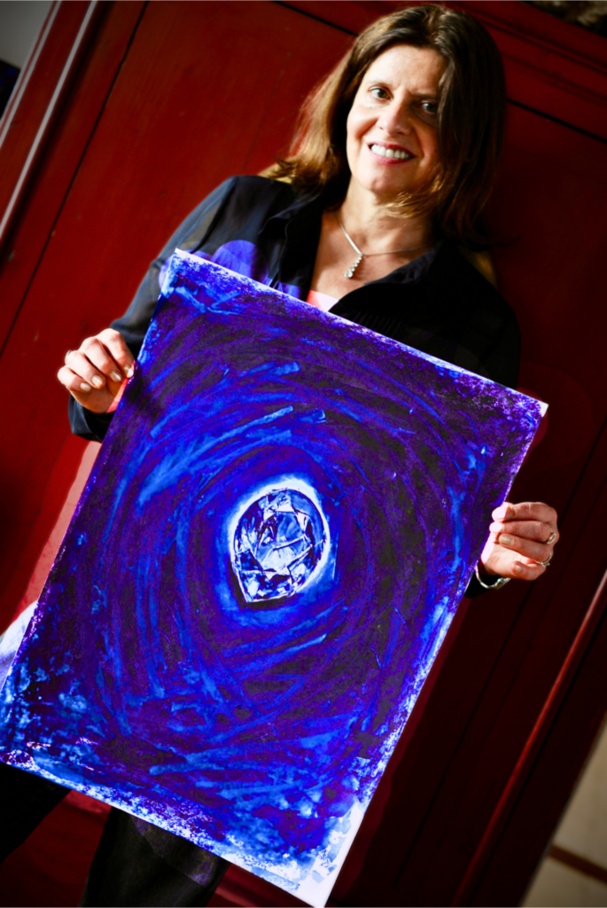 Regine Blot with the original painting of the Talisman album cover