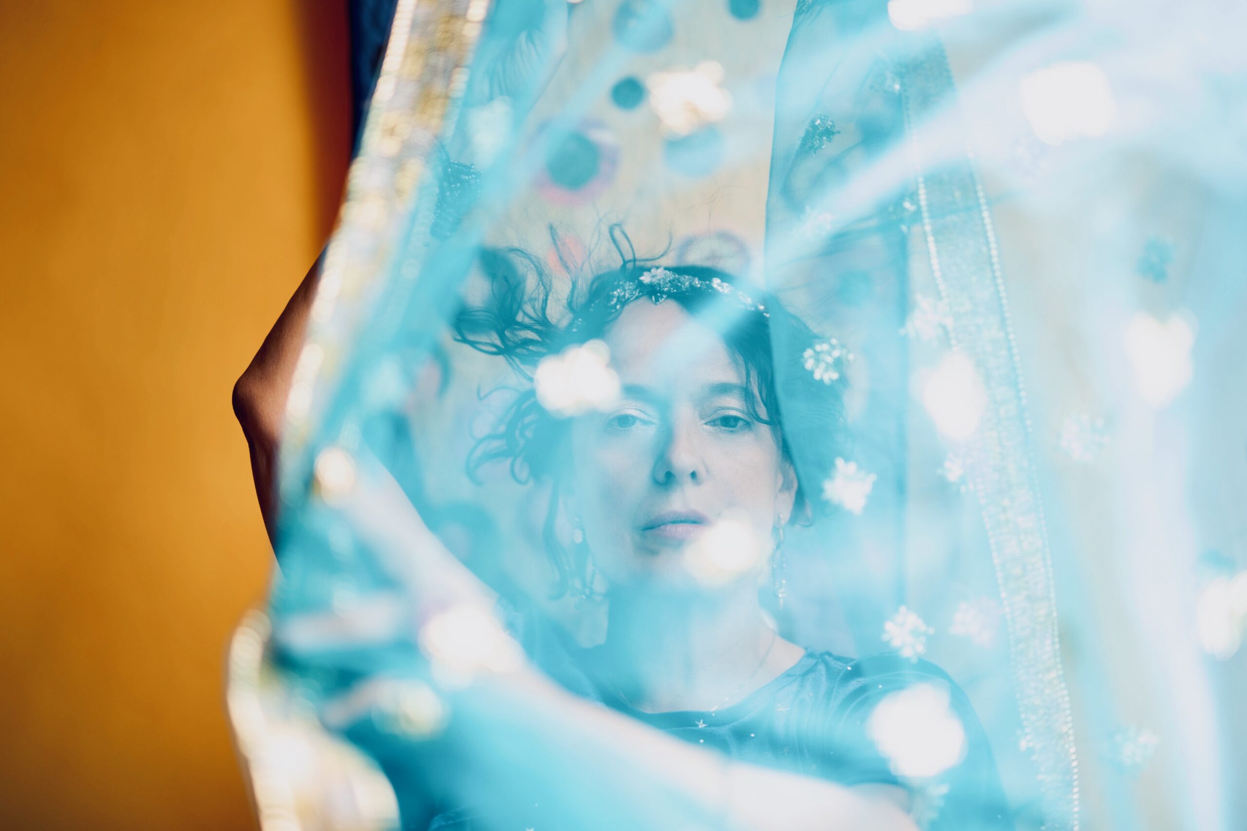 Tudyka dancing with a blue veil